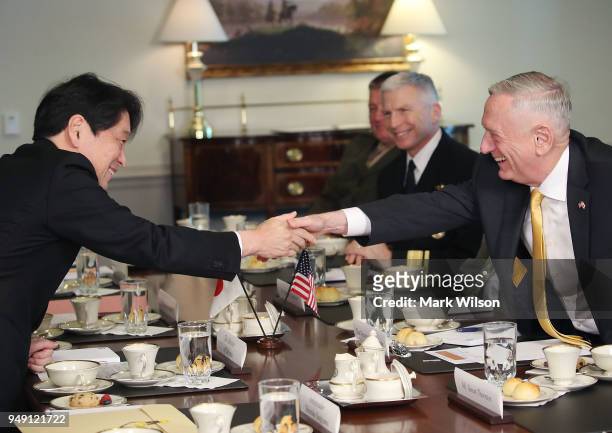 Secretary of Defense James Mattis , shakes hands with Japanese Defense Minister Itsunori Onodera during a luncheon at the Pentagon, on April 20, 2018...