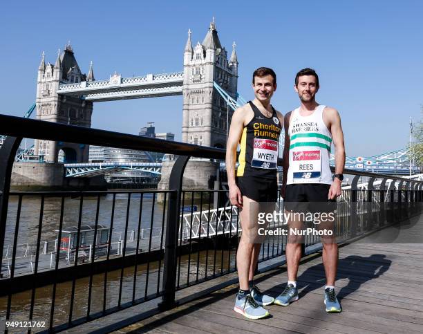 David Wyeth and Matthew Rees prepare for the 2018 Virgin Money London Marathon by the Tower Bridge in London, England on the 20th of April, 2018.