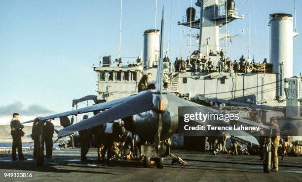 Squadron Sea Harrier aircraft landing on HMS Fearless L10 during the Falklands War 1982. It was unable to land at the damaged Sheathbill air strip,...