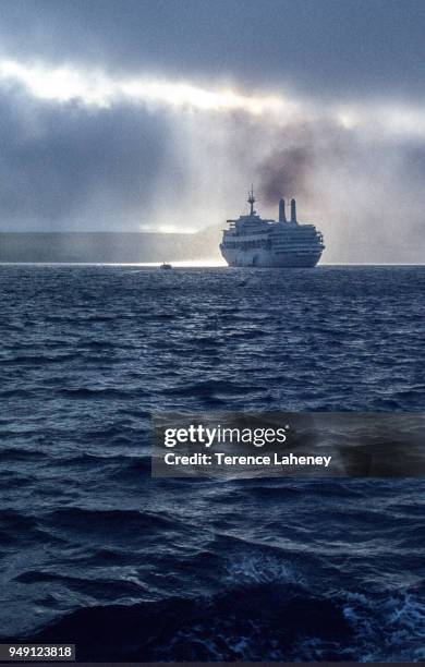 Commandeered liner SS Canberra off the shore of Port Stanley during the Falklands War, 1982.