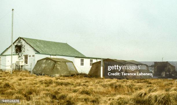 Mortar damage to airfield building in Port Stanley, during the Falklands War, June 1982.