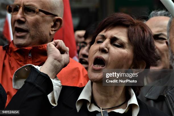 Woman chants slogans during a protest held by the leftist opposition Patriotic Party against the alliance between the ruling Justice and Development...