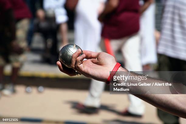 the petanque throw - petanque stock pictures, royalty-free photos & images