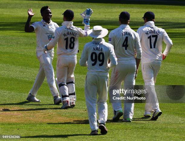 Fidel Edwards of Hampshire ccc celebrates the catch of Surrey's Rory Burns Sam Northeast of Hampshire ccc during Specsavers County Championship -...