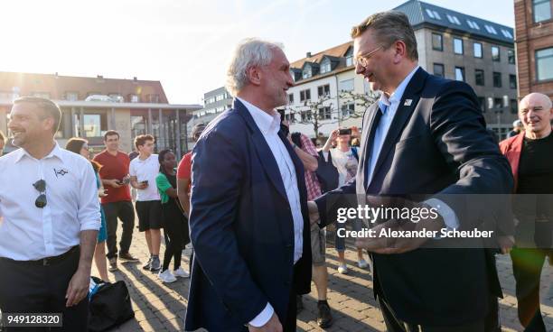 President Reinhard Grindel welcomes Rudi Voeller during the 125th anniversary of 1. Hanauer FC on April 20, 2018 in Hanau, Germany.