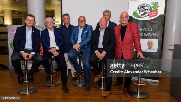 President Reinhard Grindel and Rudi Voeller pose with players of the 1978/1979 season of Hanauer FC during the 125th anniversary of 1. Hanauer FC on...
