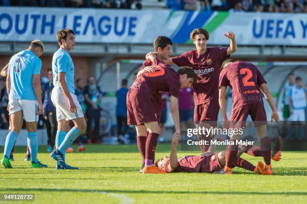 Barcelona celebrate their win after the semi-final football match between Manchester City and FC Barcelona of UEFA Youth League at Colovray Sports...