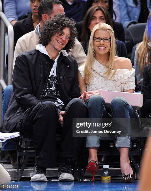 Howard Stern and Beth Ostrosky attend the Los Angeles Clippers vs New York Knicks game at Madison Square Garden on December 18, 2009 in New York City.