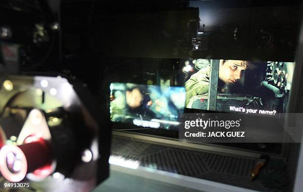 Images from the Israeli movie �Lebanon� are seen from the projection room of a cinema in Herzliya, north of Tel Aviv, on November 27, 2009. Israeli...