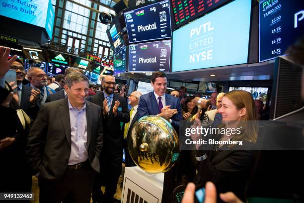 Cynthia Gaylor, chief financial officer of Pivotal Software Inc., right, rings a ceremonial bell with Rob Mee, chief executive officer of Pivotal...