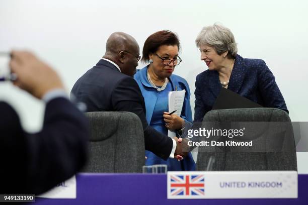 President of Ghana, Nana Akufo-Addo bids farewell to British Prime Minister Theresa May after taking part in the final press conference of CHOGM 2018...