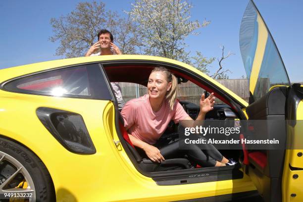 Porsche Brand Ambassadors Maria Sharapova and Mark Webber interact during a break of driving with the high performance sports car Porsche 911 RT2 RS...