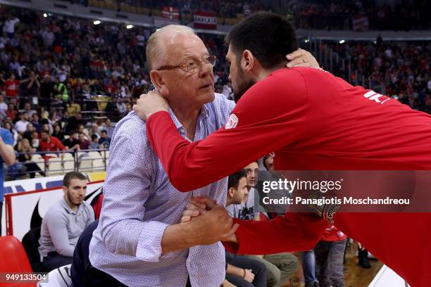 Dusan Ivkovic, former Euroleague coach and a Euroleague Basketball Legend, exchange handshake with Kostas Papanikolaou, #16 of Olympiacos Piraeus...