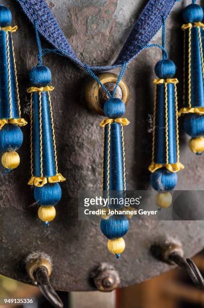 passementerie, five finished empire fringes, blue, gold, decorated with spun vellum flowers, attached to crepine or woven border, munich, bavaria, germany - embellishment border stock pictures, royalty-free photos & images