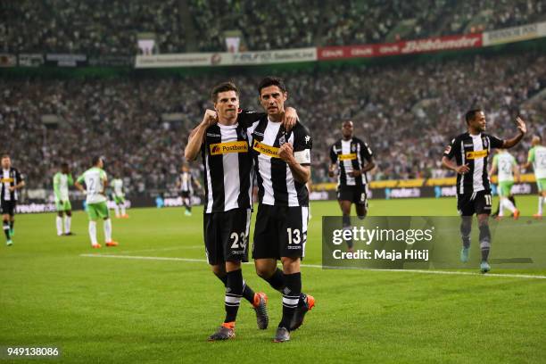 Lars Stindl of Moenchengladbach celebrates with Jonas Hofmann after scoring his teams first goal to make it 1-0 during the Bundesliga match between...