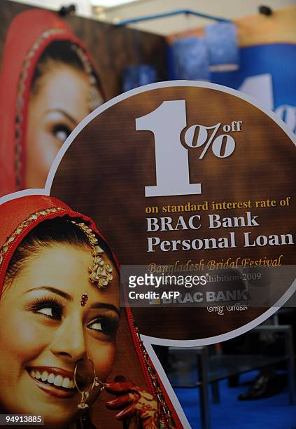 Bangladeshi bank advertises offers for personal wedding loans at a bridal apparel and jewelry exhibition in Dhaka on Dcember 19, 2009. The festival...