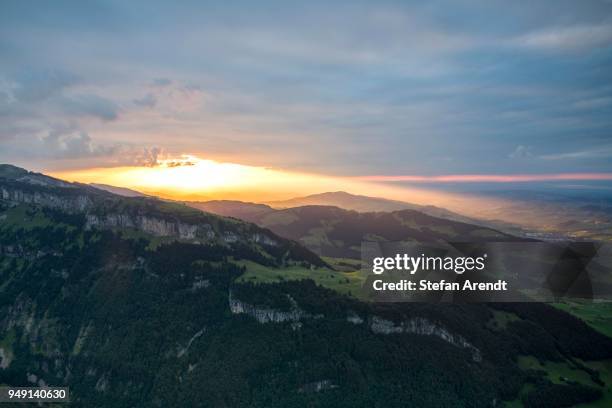 view of ebenalp and aescher from alpsigel at sunset, bruelisau, appenzell innerrhoden, switzerland - appenzell innerrhoden stock pictures, royalty-free photos & images