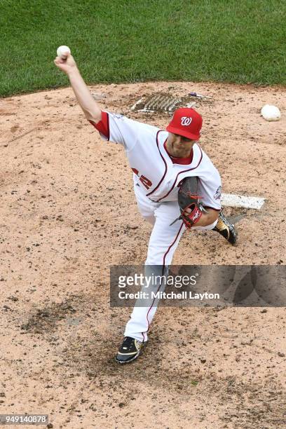 Brandon Kintzler of the Washington Nationals pitches during a baseball game against the Colorado Rockies at Nationals Park on April 15, 2018 in...