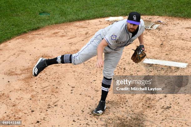 Brian Shaw of the Colorado Rockies pitches during a baseball game against the Washington Nationals at Nationals Park on April 15, 2018 in Washington,...