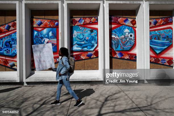 Student leaves Kenwood Academy High School for National School Walkout Day to protest school violence on April 20, 2018 in Chicago, Illinois....