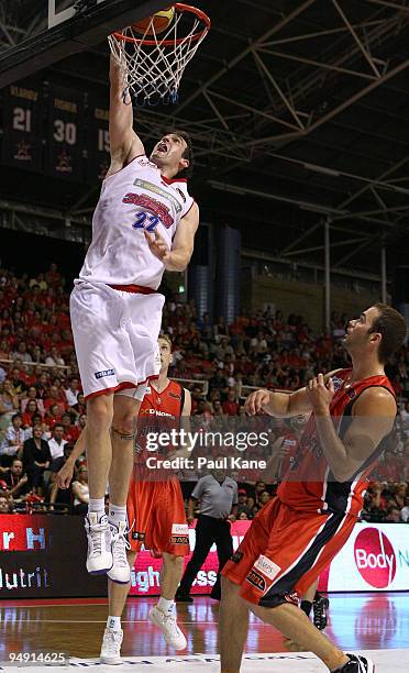 Matthew Burston of the 36'ers lays up during the round 13 NBL match between the Perth Wildcats and the Adelaide 36ers at Challenge Stadium on...