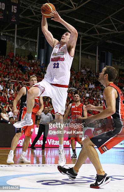 Matthew Burston of the 36'ers lays up during the round 13 NBL match between the Perth Wildcats and the Adelaide 36ers at Challenge Stadium on...