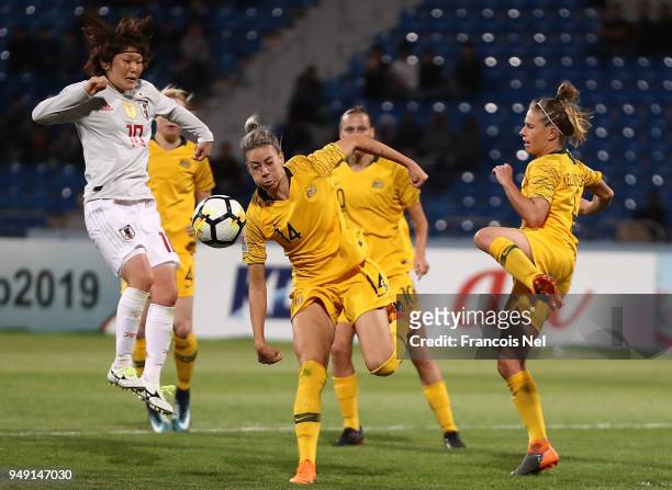Mizuho Sakaguchi of Japan and Alanna Kennedy of Australia in action during the AFC Women's Asian Cup final between Japan and Australia at the Amman...