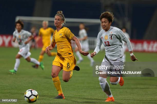 Japan's forward Yuika Sugasawa vies for the ball with Australia's midfielder Elise Kellond-Knight during the AFC Women's Asian Cup Finals match...