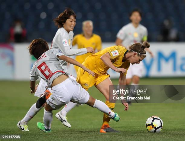 Mana Iwabuchi of Japan and Elise Kellond-Knight of Australia battle for the ball during the AFC Women's Asian Cup final between Japan and Australia...