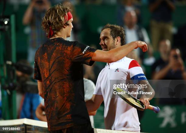 Alexander Zverev of Germany is congratulated by Richard Gasquet of France during day six of the ATP Masters Series Monte Carlo Rolex Masters at...