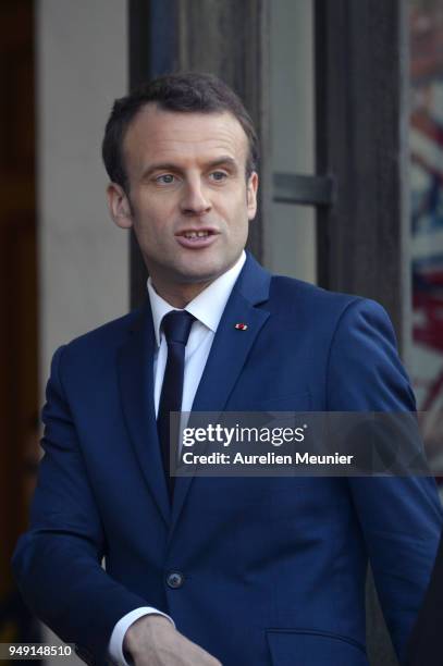 French President Emmanuel Macron escorts Senegal President Macky Sall after a meeting at Elysee Palace on April 20, 2018 in Paris, France. Senegal...