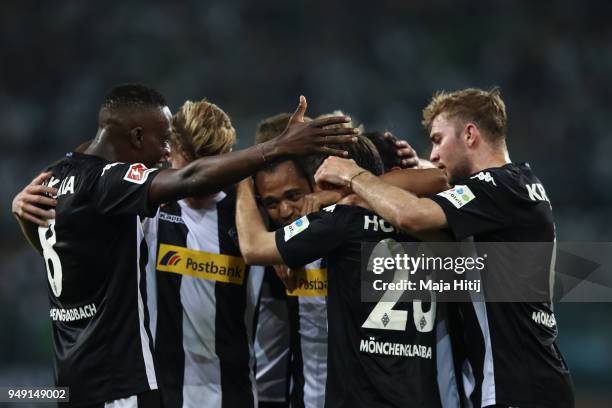 Raffael of Moenchengladbach celebrates with his team mates after scoring his teams second goal to make it 2-0 during the Bundesliga match between...