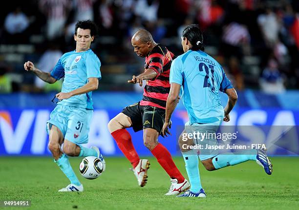 Denilson of Pohang Steelers scores the opening goal past Luis Velasquez and Daniel Arreola of Atlante during the FIFA Club World Cup third place...