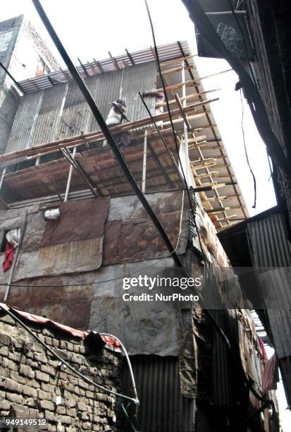 Working class people and their family are living at these unplanned, narrow and easy-to-collapse tin made establishments in capitals Islambagh of...