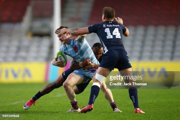 Fg Off Sam Randle of the Royal Air Force Seniors is tackled at Twickenham Stoop on April 20, 2018 in London, England.