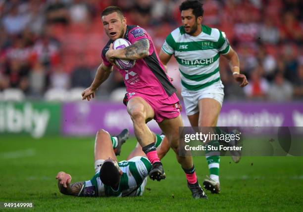 Jason Woodward of Gloucester barges through the tackle of Josh Matavesi of the Falcons their first try during the European Challenge Cup Semi-Final...