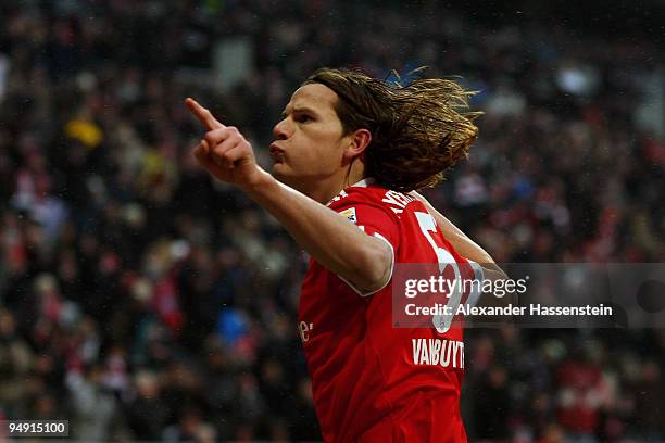 Daniel van Buyten of Muenchen celebrates scoring his first team goal during the Bundesliga match between Bayern Muenchen and Hertha BSC Berlin at the...