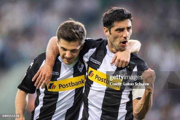 Jonas Hofmann and Lars Stindl of Moenchengladbach celebrate their teams second goal during the Bundesliga match between Borussia Moenchengladbach and...