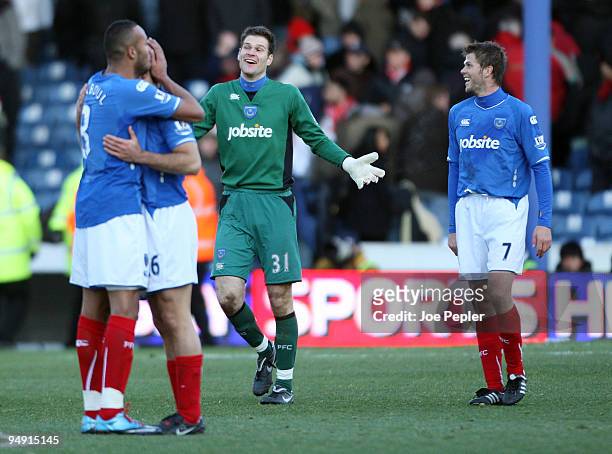 Tal Ben Haim, Younes Kaboul, Asmir Begovic and Hermann Hreidarsson of Portsmouth celebrate win after the Barclays Premier League match between...