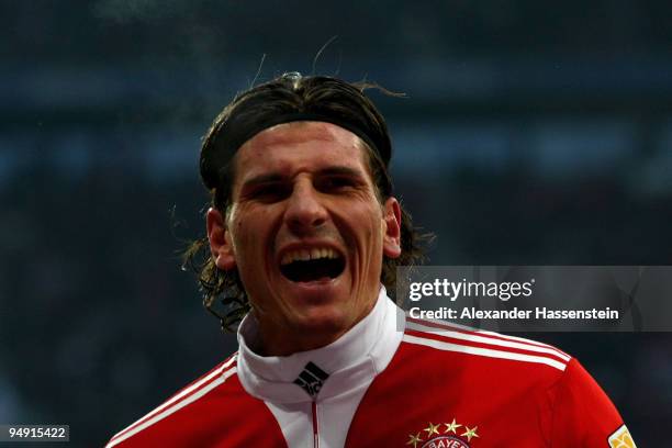 Mario Gomez of Muenchen celebrates scoring the 2nd team goal during the Bundesliga match between Bayern Muenchen and Hertha BSC Berlin at the Allianz...