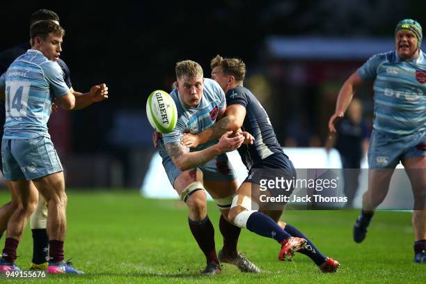 Sgt Matthew Brougham of the Royal Air Force Seniors is tackled at Twickenham Stoop on April 20, 2018 in London, England.