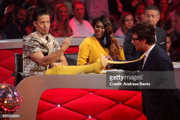 Juror Jorge Gonzalez shows his yellow boots to Motsi Mabuse, Joachim Llambi and Host Daniel Hartwich on stage during the 5th show of the 11th season...