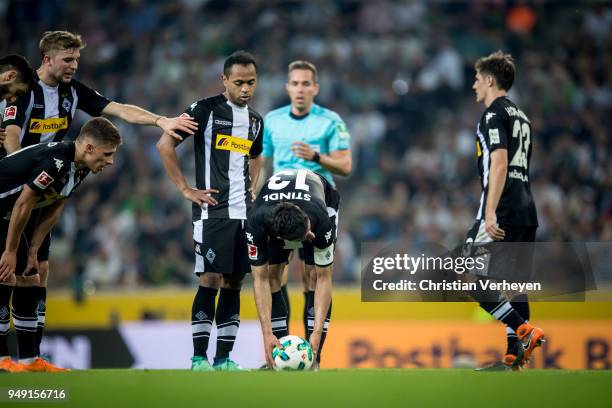 Lars Stindl of Borussia Moenchengladbach disposes the ball for the free kick during the Bundesliga match between Borussia Moenchengladbach and VfL...