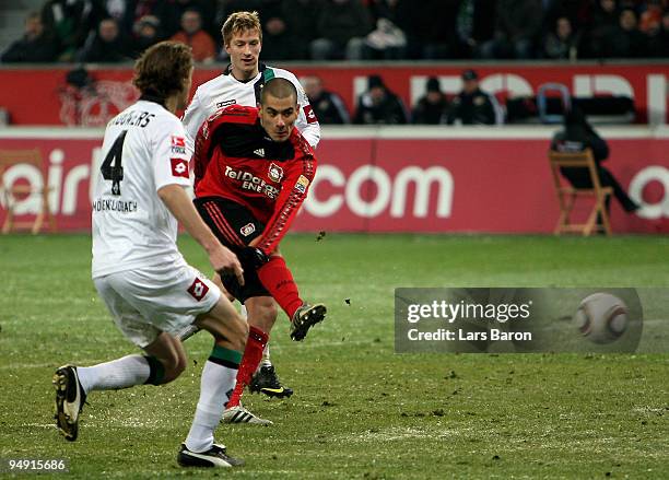 Eren Derdiyok of Leverkusen scores his teams second goal during the Bundesliga match between Bayer Leverkusen and Borussia Moenchengladbach at...