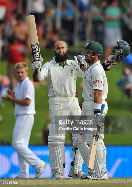 Mark Boucher congratulates Hashim Amla of South Africa after his century during day 4 of the 1st Test match between South Africa and England from...