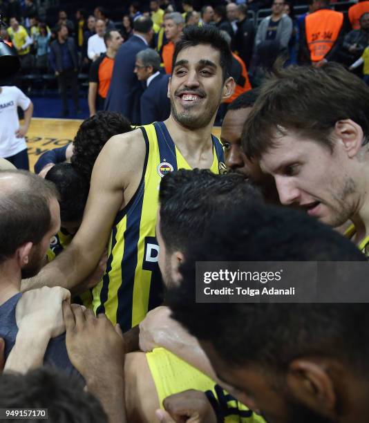 Ahmet Duverioglu, #44 and Jan Vesely, #24 of Fenerbahce Dogus celebrate with his teammates after the Turkish Airlines Euroleague Play Offs Game 2...