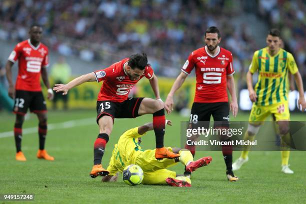 Rami Bensebaini of Rennes and Jules Iloki of Nantes during the Ligue 1 match between Nantes and Rennes at Stade de la Beaujoire on April 20, 2018 in...