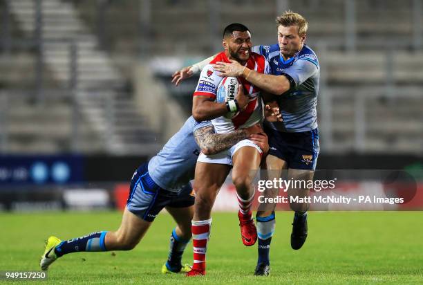 St Helens' Dominique Peyroux is tackled by Huddersfield Giants' Ryan Hinchcliffe during the Betfred Super League match at the Totally Wicked Stadium,...