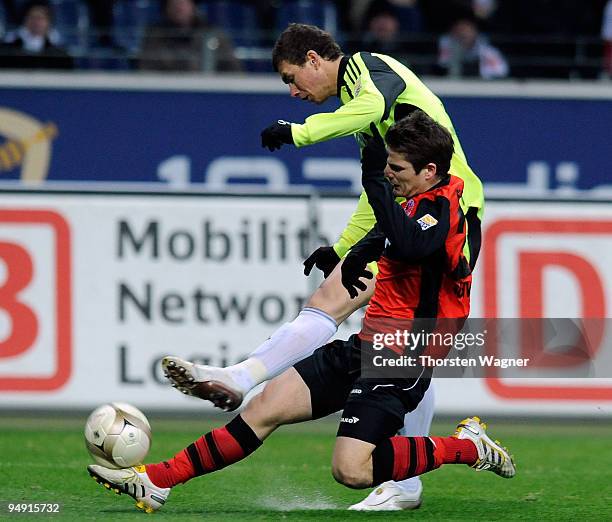 Pirmin Schwegler of Frankfurt battles for the ball with Edin Dzeko of Wolfsburg during the Bundesliga match between Eintracht Frankfurt and VFL...