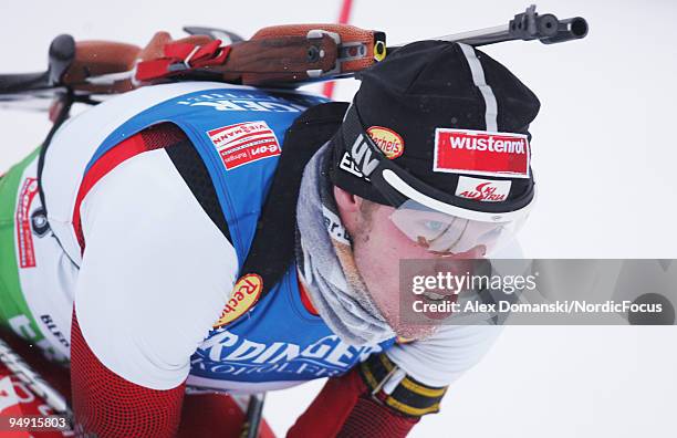 Dominik Landertinger of Austria competes during the Men's 10km Sprint in the e.on Ruhrgas IBU Biathlon World Cup on December 19, 2009 in Pokljuka,...